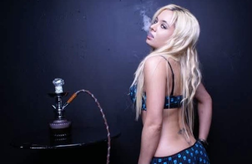 Jennifer Jorgensen Ahmed by a hookah, studio portrait