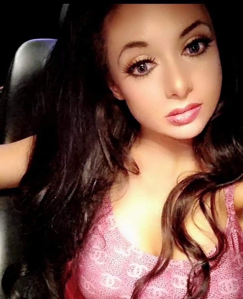 Jennifer Jorgensen Ahmed in a pink top, selfie