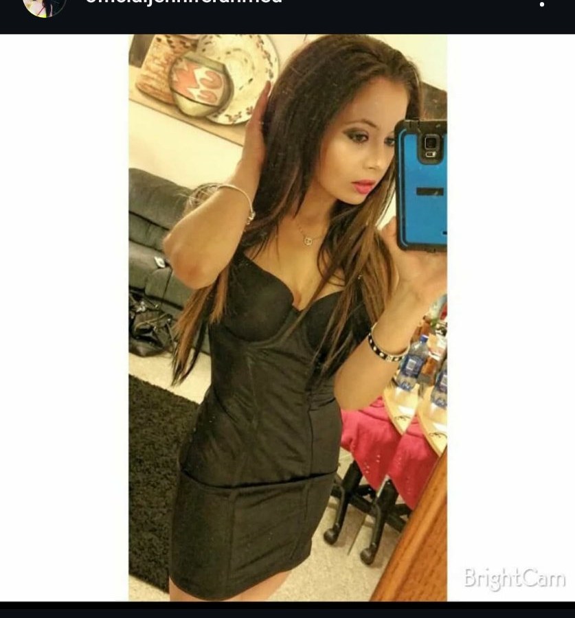 Jennifer Jorgensen Ahmed in a black dress, mirror selfie