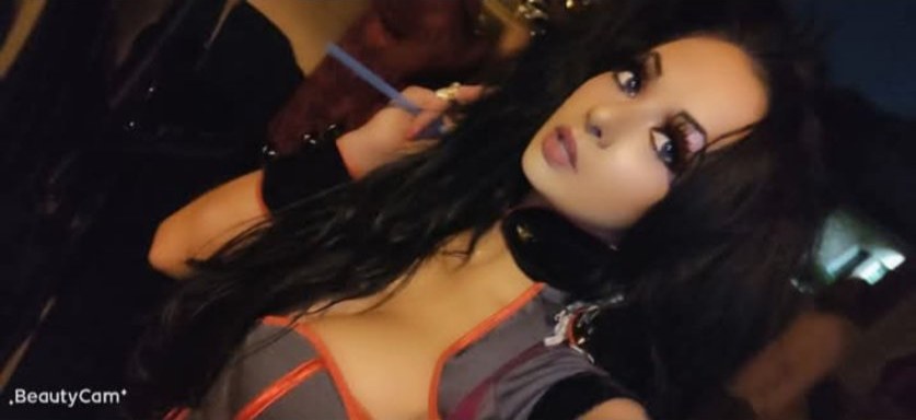 Jennifer Jorgensen Ahmed, dark-haired selfie