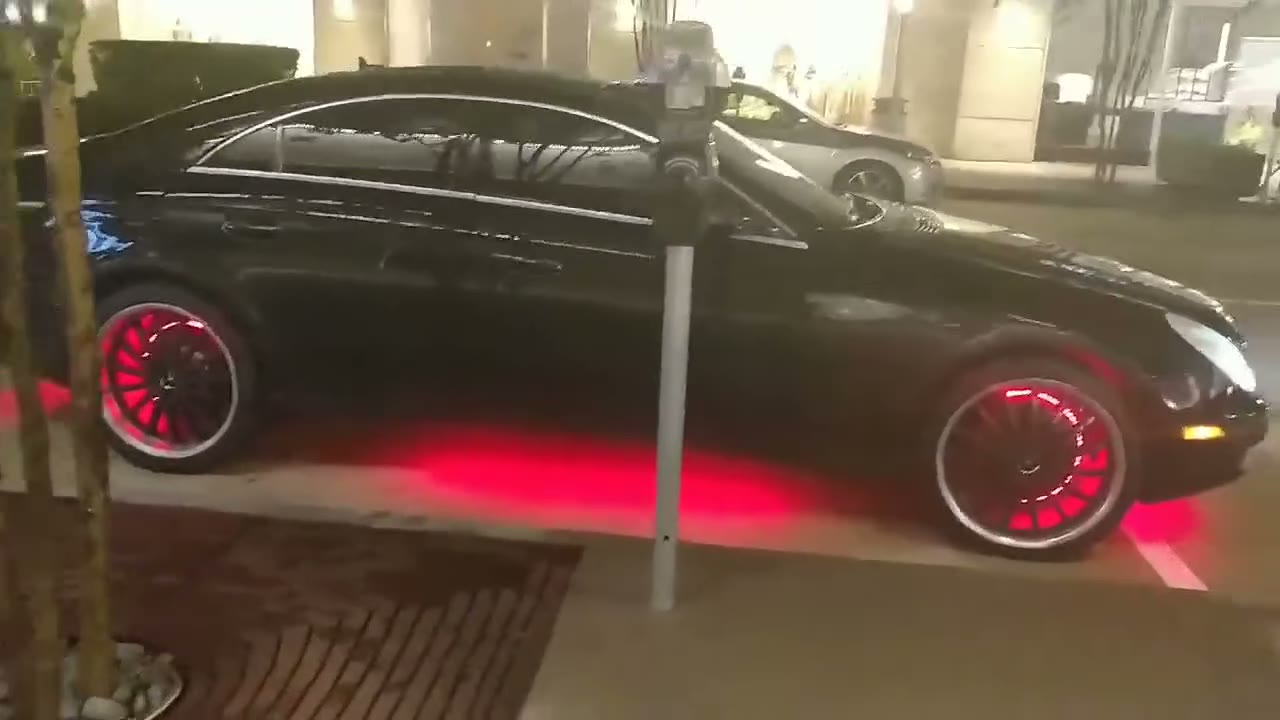 Jennifer's stolen black Mercedes-Benz with red underglow and red-lit wheels